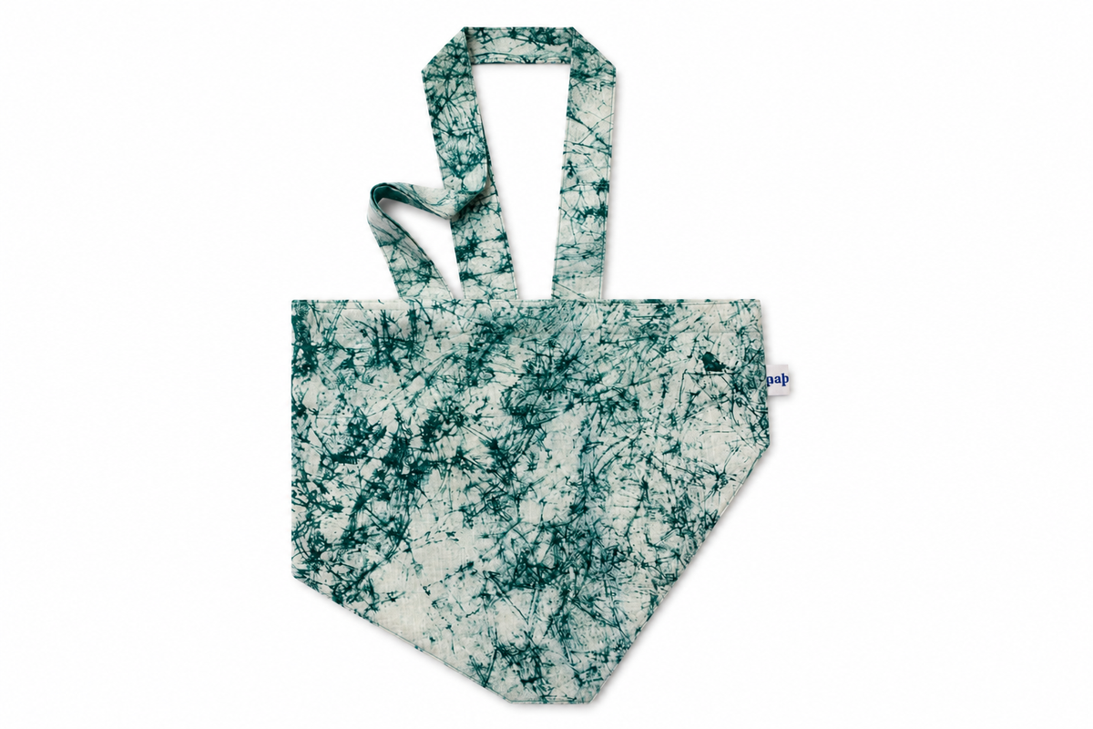 white and green crackle bib