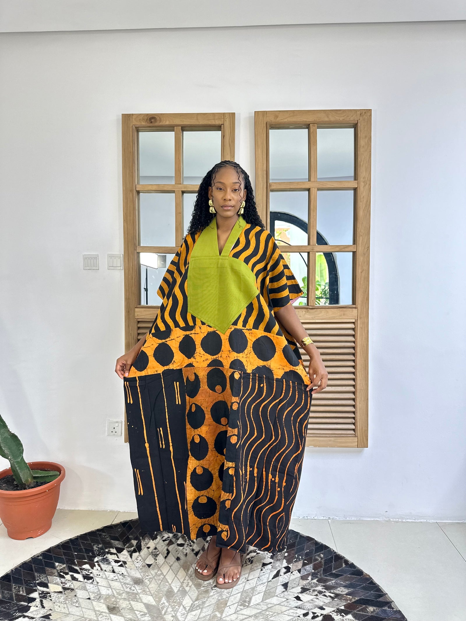 orange and black multiprint agbada with olive asooke 