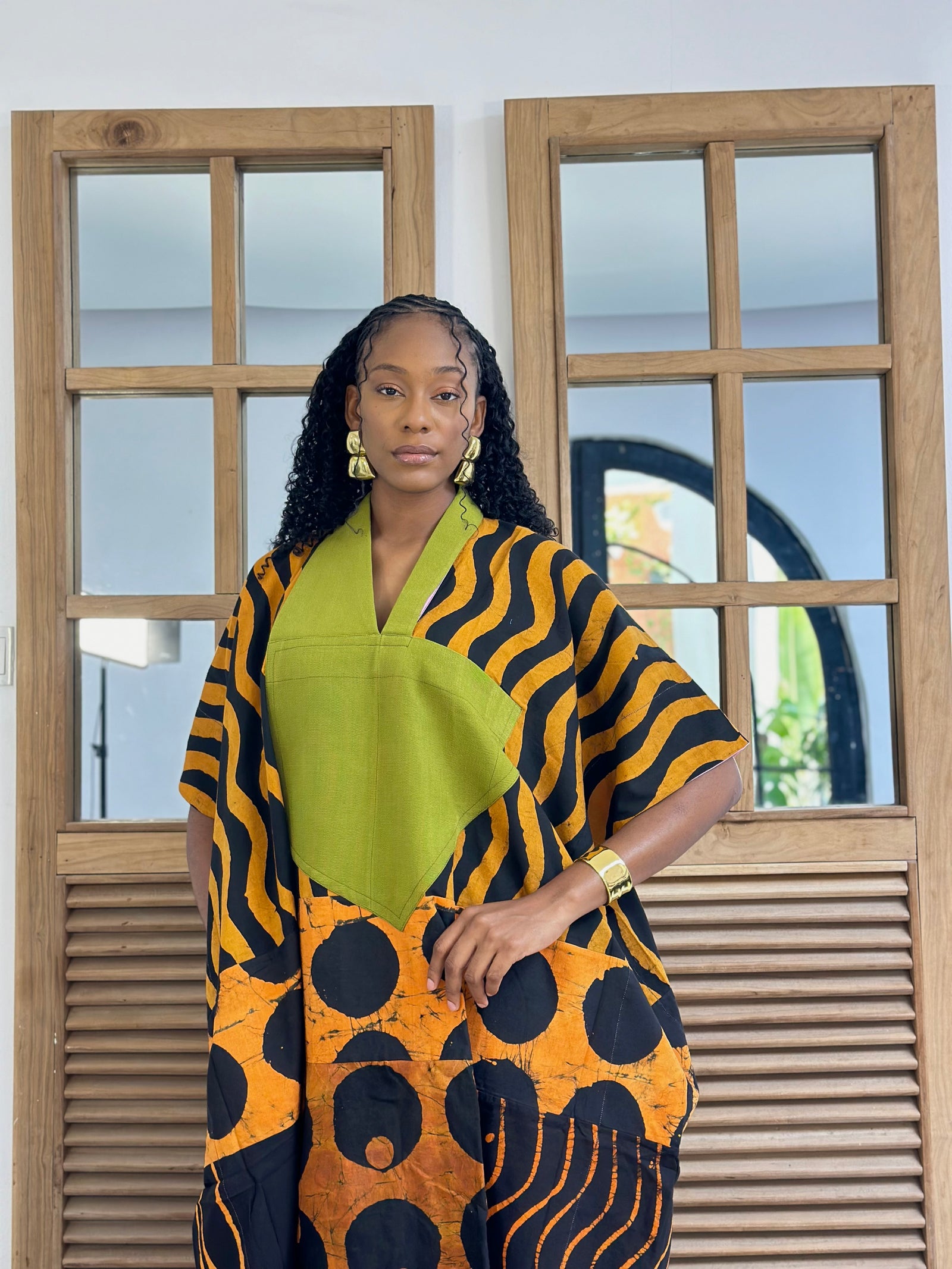 orange and black multiprint agbada with olive asooke 