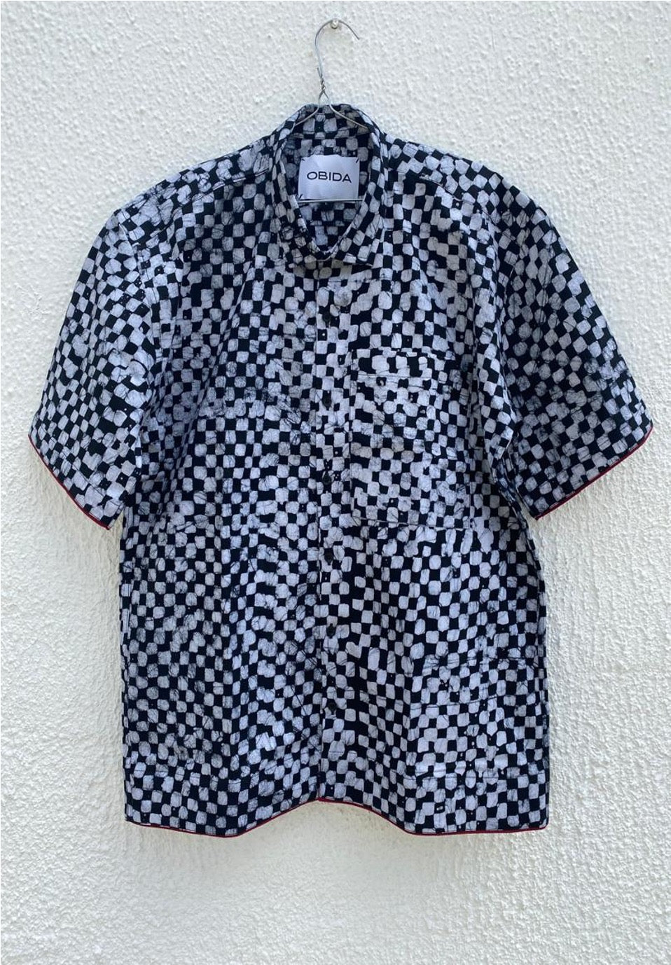 CHECKERED BLACK AND WHITE SHIRT