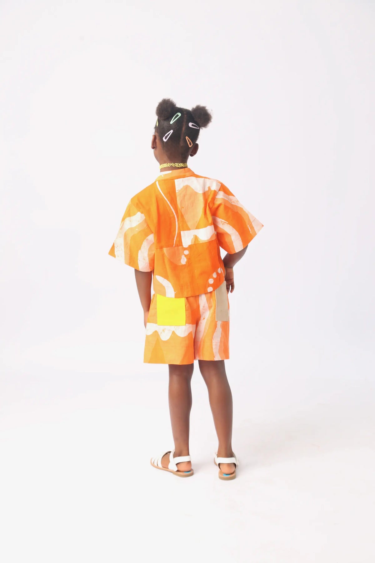white and tangerine multiprint crop shirt